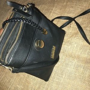 Kenneth Cole Black Crossbody purse.